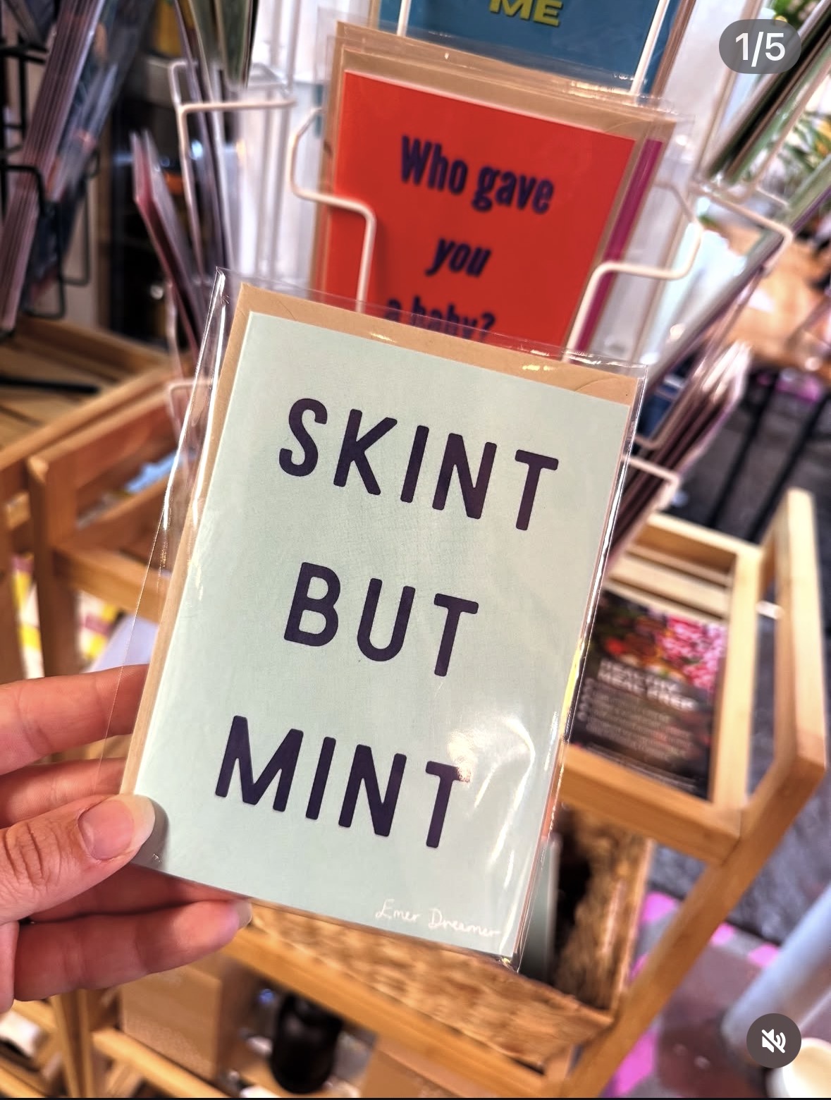 Greeting cards on a rack in the Moonchi gift shop