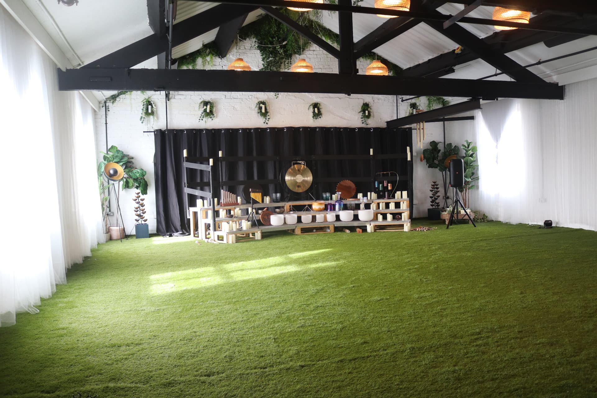 Chill Studio set up with singing bowls, gongs and space for a sound journey