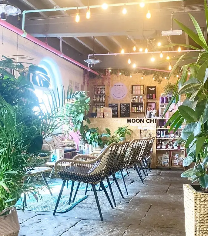 Moonchi crystal shop counter and café lounge seating
